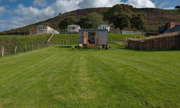 This shows the size of the paddock.  There are 3 caravans only behind which are privately owned.  It is possible to walk up the hill in the background